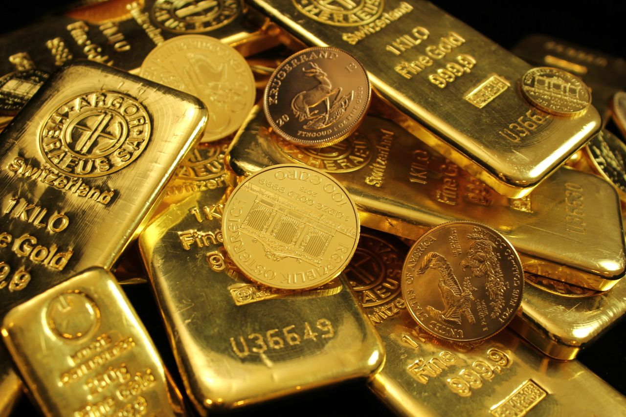 Authenticated gold bars and bullion coins prepared for auction
